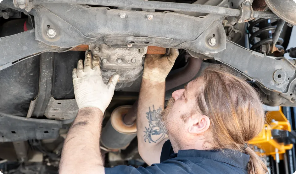Oil change services In Rancho Santa Margarita, CA At Bobby Grich Auto Repair. Mechanic performing oil change service in auto repair shop