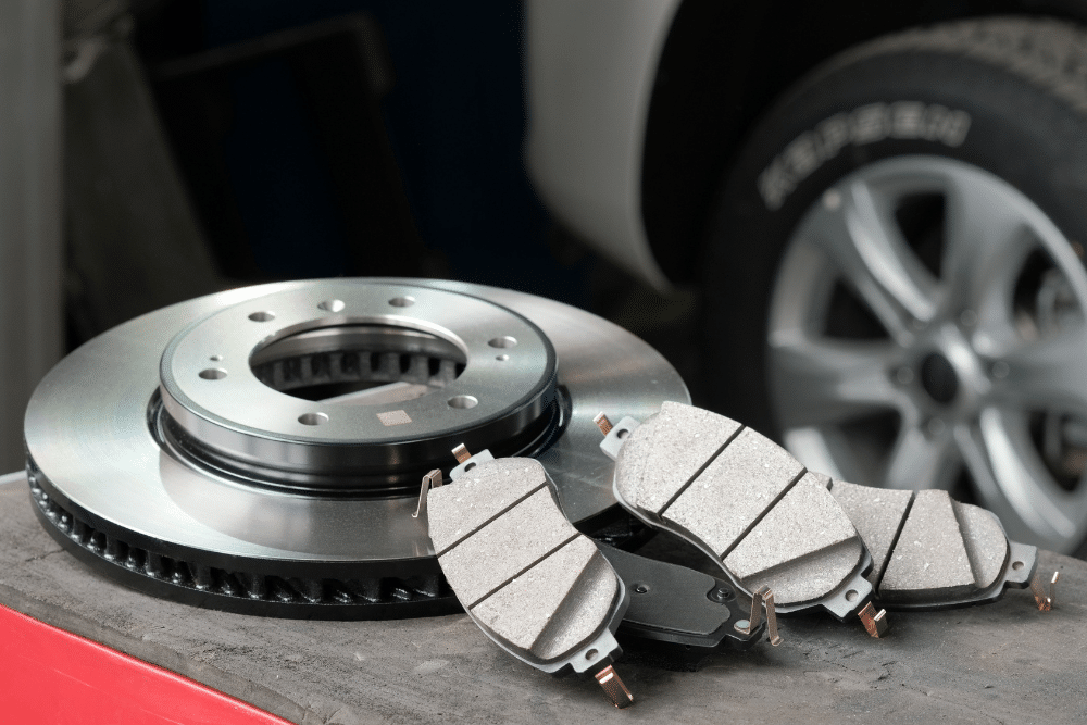 Brake pad and rotor replacement, auto repair in Temecula, CA, at Bobby Grich Auto Repair of Temecula. Image of brake rotors and brake pads ready for installation, highlighting essential brake system components that restore stopping power, improve braking performance, and enhance vehicle safety through professional brake repair and replacement.